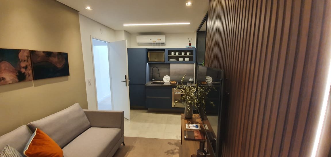 Sala de estar em Studio de alto padrão em Pinheiros, Sp